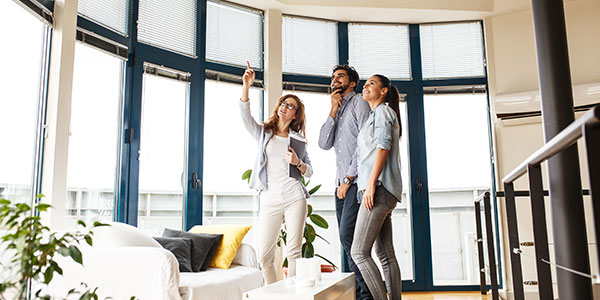 Consultant measuring windows